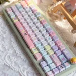 Vibrant Sanrio PBT dye-sub keycaps set showcasing beloved characters like Hello Kitty and My Melody. This joyful, colorful set is perfect for a charming setup.
