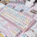 Iconic Sanrio PBT keycap set, featuring charming characters in vibrant colors and a playful aesthetic, perfect for fans.