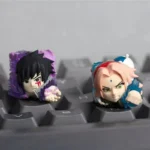 Artistic Naruto Sasuke backlit resin ESC keycap, featuring detailed anime character art and luminous translucent resin from various perspectives.