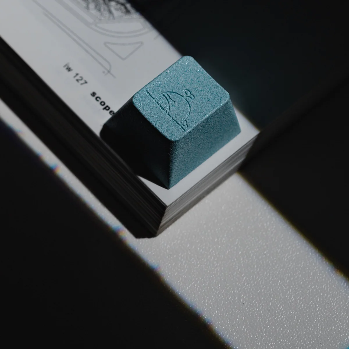 Sea Salt Whale Keycap, beautifully sculpted from various angles, highlighting its serene oceanic design and cool blue hues.