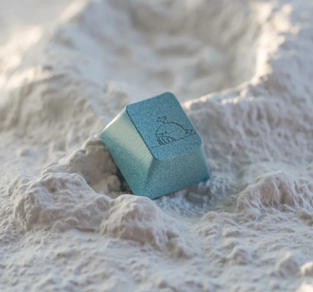 Sea Salt Whale Keycap featuring a sculpted whale in cool blue hues, highlighting its unique artistic design.