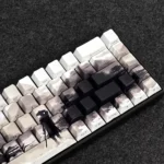 Shadow Side-Engraved Keycaps Set gallery. See the sleek Cherry profile from multiple angles. Backlit, dye-sublimated legends offer a premium, minimalist look.