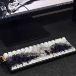 Sleek Shadow Side-Engraved Keycaps Set, Cherry profile, dye-sublimated for a minimalist aesthetic. Legends subtly backlit, highlighting the premium side-engraved.