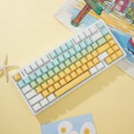 Side view of the Shallow Dream PBT keycaps set, revealing their ergonomic sculpted profile and soft pastel sky motif against a dreamy backdrop.