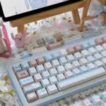 Adorable Sheep PBT Keycaps Set, Cozy Charm Set, shown from various angles. Highlights whimsical design, soft pastel colors, durable PBT, and crisp dye-sub design.