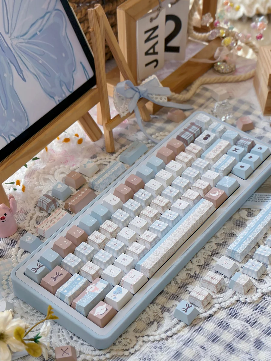 Adorable Sheep PBT Keycaps Set main display, featuring whimsical pastel sheep designs, durable PBT, and crisp dye-sub for a cozy desktop.