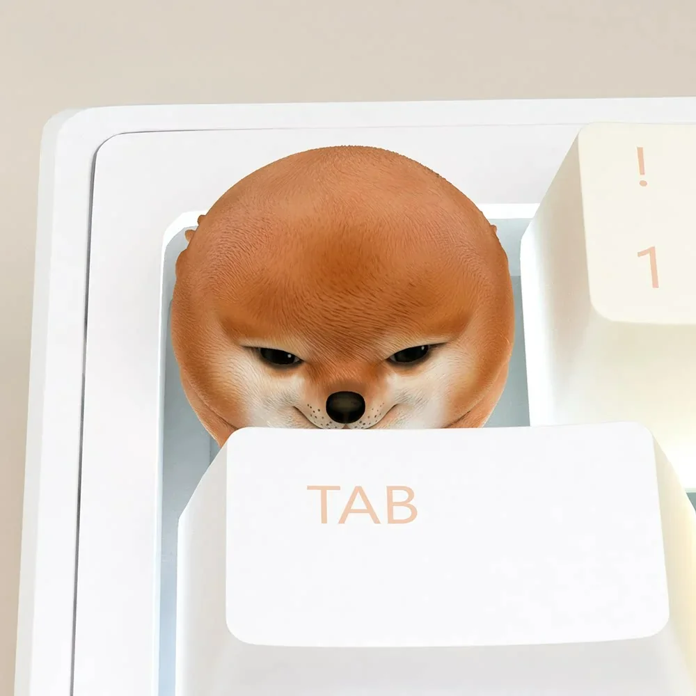 A charming handcrafted Shiba Inu ESC keycap, playfully guarding your keyboard with its cute presence. Perfect for tech enthusiasts.