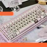 Whimsical pink Siamese cat PBT keycap set, captured in vibrant close-up. This adorable keycap showcases its charming illustration and durable surface.