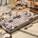 Playful Siamese cat MOG profile keycaps, showcasing adorable feline motifs from multiple angles with soft, warm colors.