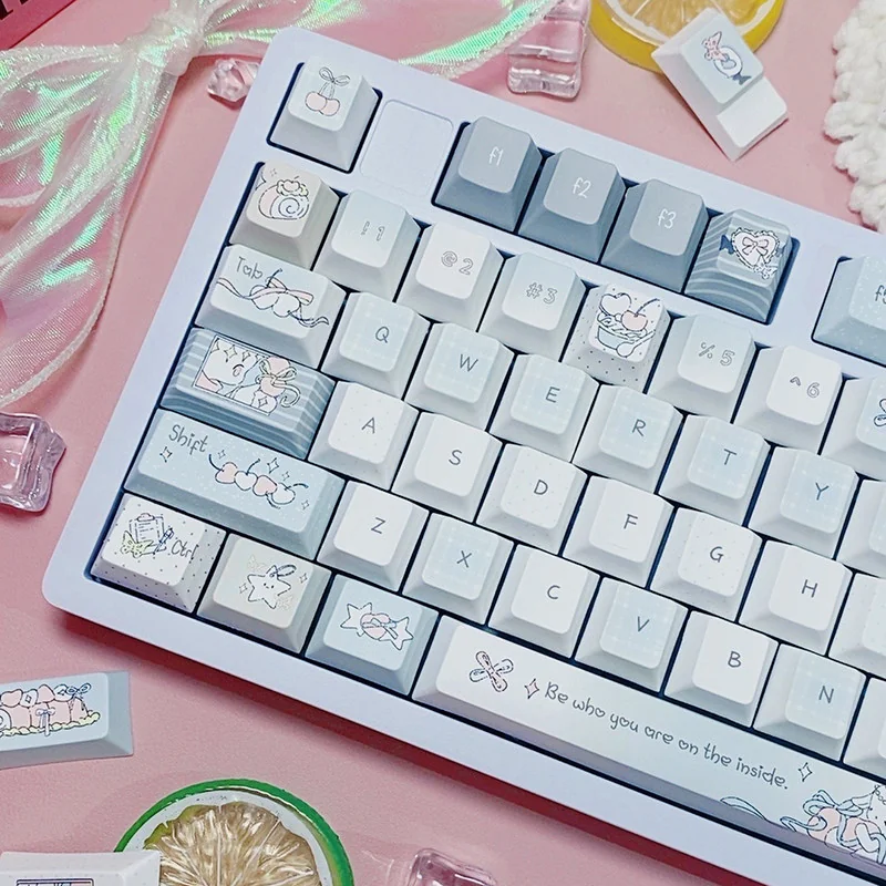 Charming Sleepy Sheep PBT Keycaps Set displayed with adorable pastel sheep motifs for a cozy, whimsical keyboard aesthetic.