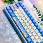 Whimsical Space Bear PBT dye-sub keycaps set. Artistic bear astronauts and cosmic designs on durable PBT. Vibrant dye-sublimation shown from various angle.