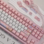 Close-up of the Playful Space Rabbit PBT Dye-sub Keycap Set, highlighting whimsical pastel space rabbits, stars, and planets on durable PBT keycaps.