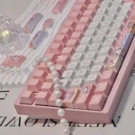 Unique Playful Space Rabbit PBT Dye-sub Keycap Set from a new angle. Shows cute space rabbits, stars, and pastel cosmic planets on keycaps.