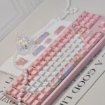 Playful Space Rabbit PBT Dye-sub Keycap Set. Multiple views show cute space rabbits, cosmic stars, and planets in a whimsical pastel palette.