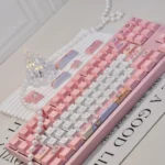 Playful Space Rabbit PBT Dye-sub Keycap Set, showing cute space rabbits, pastel planets, and stars. Unique cosmic keycaps with a whimsical design.