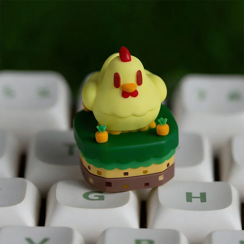Close-up of the exclusive Stardew Valley Chicken ESC keycap, showcasing its charming pixel art design and vibrant farm aesthetic from a playful angle.