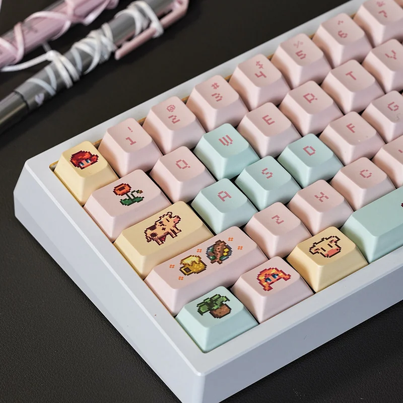 Vibrant Stardew Valley Pixel Art PBT Cherry keycaps set from various angles, showcasing charming pixelated characters and rustic landscapes for a nostalgic design.