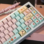 A collection of Stardew Valley pixel art PBT Cherry keycaps set from various angles, showcasing charming characters and vibrant game scenes for a nostalgic art.