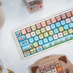 A charming close-up of Stardew Valley pixel art PBT MOA keycaps set, showcasing vibrant, whimsical game characters and rustic elements, perfect for mechanical keyboard.