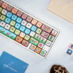 A charming close-up of a Stardew Valley Pixel Art PBT keycap set, showcasing its whimsical pixelated characters and the rustic beauty of the game world.