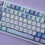 Starlight PBT Keycaps set, displayed from multiple angles, reveals durable PBT construction and captivating cosmic wonder with ergonomic comfort.