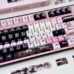 This unique Whimsical Statue of Liberty Girl PBT Keycap Set is shown from a different angle, highlighting its vibrant hues artistic patriotic setup.