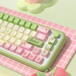 A delightful view of the Strawberry Milk Rabbit PBT Keycap Set, showing cute bunny motifs in pastel hues, capturing its sweet whimsical charm.