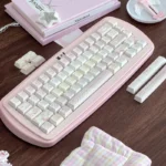 Explore various angles of the Sweet Strawberry Milkshake PBT Dye-Sub Keycap Set, highlighting its pastel pink, dessert-inspired design and whimsical design.