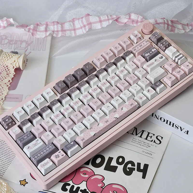 Whimsical Strawberry Rabbit PBT dye-sub keycaps set showcasing adorable pastel strawberries and charming bunnies, enhancing a sweet desktop aesthetic.