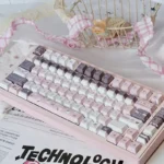 Whimsical Strawberry Rabbit PBT Dye-sub Keycap Set showcasing adorable pastel illustrations of cute strawberries and charming rabbits for a sweet design.