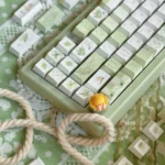 Close-up of Summer Rain PBT keycaps set, showcasing the serene ethereal gradients on durable PBT, capturing the gentle summer rain aesthetics.