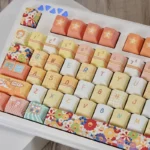 Joyful sunflower PBT keycap set, a detailed view showcasing its vibrant dye-sublimation, durable PBT, and cheerful keyboard art design.