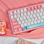 Playful Sylveon PBT keycap set for mechanical keyboards, showcasing its charming pastel design and durable material, perfect for whimsical keyboard customization.