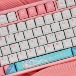 Charming Sylveon PBT keycap set for mechanical keyboard, showcasing its iconic design and premium, durable build from different angles with pastel whimsy design.