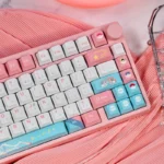 Close-up of a playful Sylveon PBT keycap set, highlighting its iconic character art and premium durability for mechanical keyboards, captured with whimsical design.