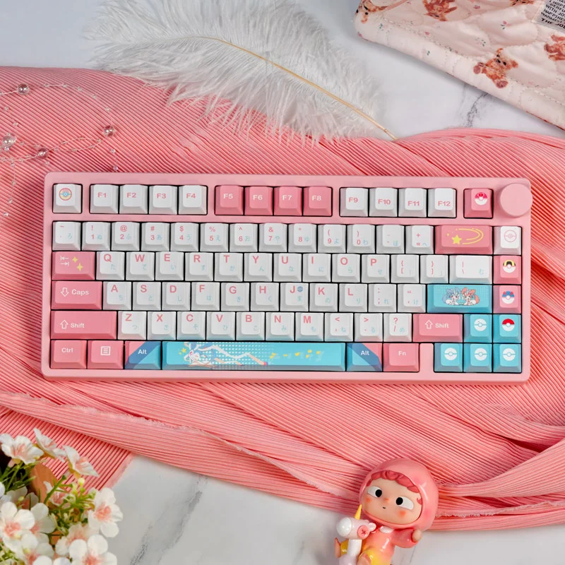 Charming Sylveon PBT keycap set for mechanical keyboards, featuring a whimsical pastel pink Sylveon design. Durable and delightful charm.