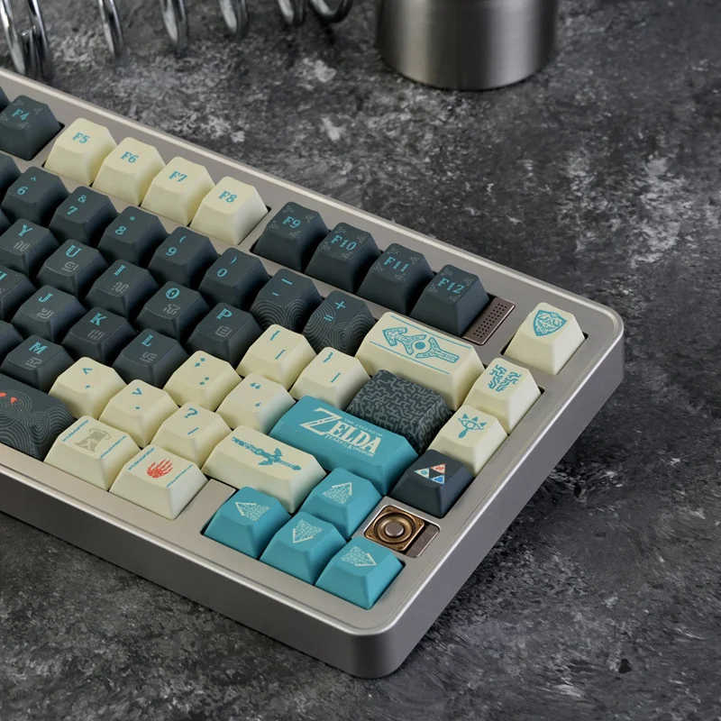 Exclusive Tears of the Kingdom PBT keycap set, displaying mystical Hyrule landscapes and ancient symbols from a unique perspective, capturing heroic setup.