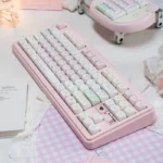 Close-up view of Tokyo Pink Keycaps Set, showcasing the exclusive Urban Diary PBT dye-sub legends and charming pastel cityscape art.