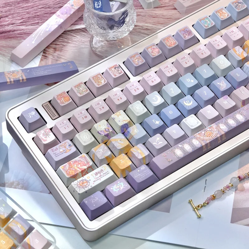 Close-up of Twelve Constellation PBT Cherry keycaps set, revealing intricate artistry and ethereal designs from a unique angle.