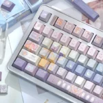 Close-up of a Twelve Constellation PBT keycap set, showcasing its ethereal, intricate design and unique artistry from a new angle.