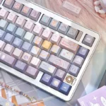Discover the unique Twelve PBT Cherry constellation keycaps set from different angles, revealing their ethereal artistry and intricate celestial design.
