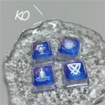 Artistic close-up of a handcrafted translucent Valorant Kay/O skill keycap, revealing its vibrant resin details and glowing energy from a unique angles.