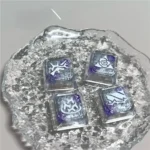 A macro shot of an artisan handcrafted Valorant Vyse skill keycap, revealing its vibrant, translucent material and intricate icon detail, perfect for fans.