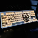 Valorant Team Heretics side-engraved backlit keycap set, showcasing its sleek legends, vibrant illumination, and dynamic esports branding setup.