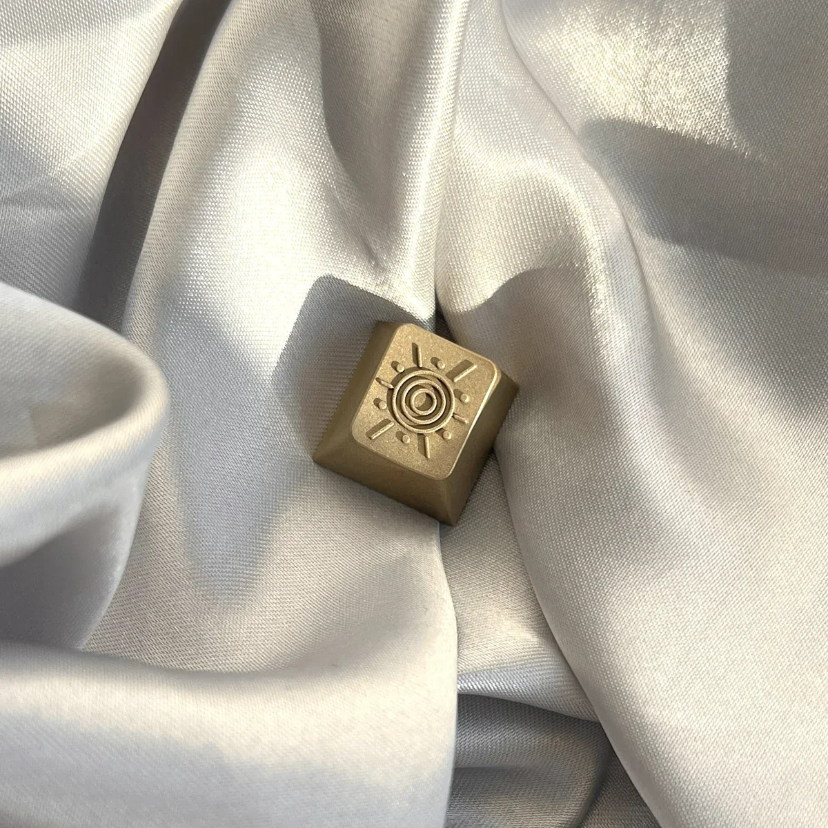 A gallery of the Premium CNC Brass Sunburst Keycap, showcasing its radiant vintage brass and intricate design from multiple elegant angles.