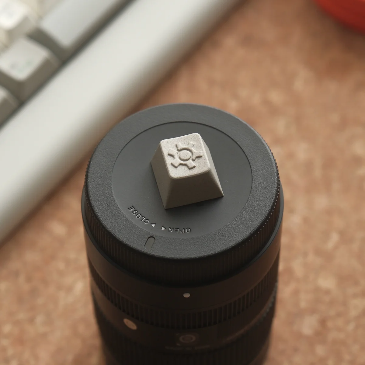 Precision CNC Vintage Gear Artisan Keycap viewed from multiple angles, highlighting its sophisticated textured linen-like finish and premium vintage industrial design.