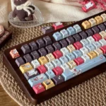 Distinctive Wacky Doll artisan keycap set in a product gallery, showcasing its quirky, cute, slightly macabre PBT dye-sub design with vibrant artistic design.