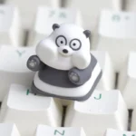 Exclusive We Bare Bears Artisan Resin Keycap gallery showcasing vibrant Grizz, Panda, and Ice Bear charms from multiple cute angles.