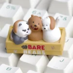 Charming handcrafted We Bare Bears artisan resin keycap showcasing Grizz, Panda, and Ice Bear. A playful and unique keyboard accessory.