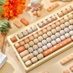 "Detailed shot of the Mantou Keycap Set, highlighting the unique rounded MOG profile and soft pastel colors that deliver whimsical cute comfort."